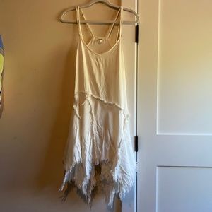 White free people dress with handkerchief raw hem. Size medium